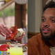 Katie breaking apart a crab; a guy named Herb